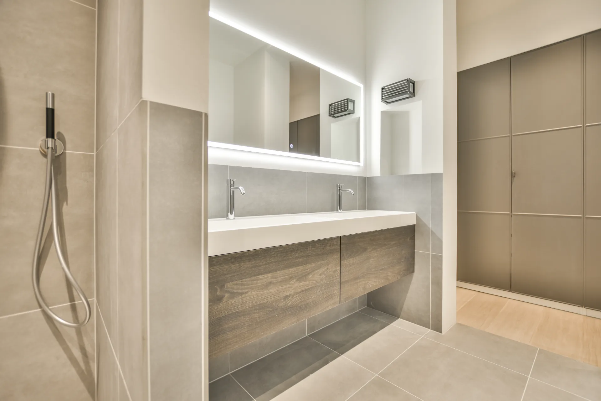 Luxury bathroom with marble walls and floating vanity